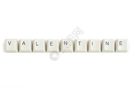 从白上分散的键盘键盘中的 valentine图片