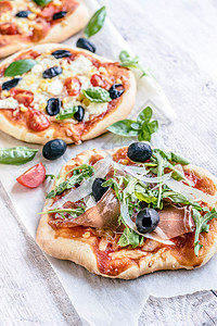 Prosciutto 微型比萨饼美味美食火腿摄影菜单食物食谱西红柿火箭餐厅图片
