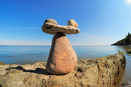 海岸上的石头卵石团体温泉相似度海滩禅意韧性等价冥想身份图片