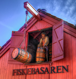 渔民木屋建筑学红色渔夫阁楼鲱鱼滑轮木头绳索标记图片