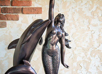 青铜雕塑美人鱼和海豚雕像艺术女孩金属国家女士图片
