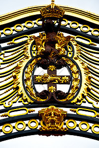 在旧金属大门的皇宫中狮子旅游纪念馆王国版税白金汉女王纪念碑历史性框架背景图片