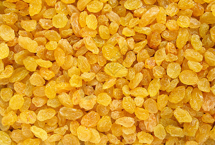 金色草原背景葡萄干水果小吃食物干果营养烹饪纤维黄色背景图片