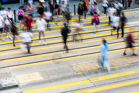 香港繁忙的十字街压力路口斑马团体运动条纹人群行人穿越喧嚣背景图片