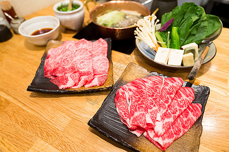 日本热锅传统蔬菜豆腐盘子美食猪肉饮食大豆汽船家庭图片