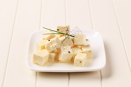 脱硫乳酪胡椒食物盘子美食立方体奶制品小吃乳酪库存图片