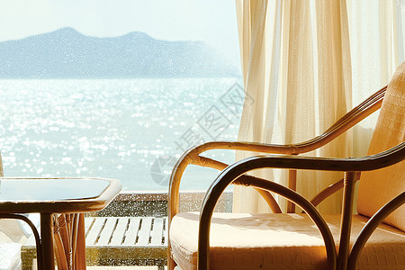 热带热带海景窗帘旅行椅子假期房子目的地旅游酒店天空海滩图片