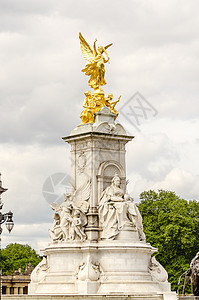 伦敦白金汉宫维多利亚纪念馆天空历史文化游客金子观光王国地标首都雕塑图片