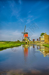 荷兰或荷兰的Kinderdijk风车和水渠天空磨坊旅行运河农村堤防风景历史力量历史性图片