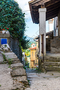 旧城的石头建筑历史人行道旅行阳光建筑学场景太阳生活卵石小飞象图片