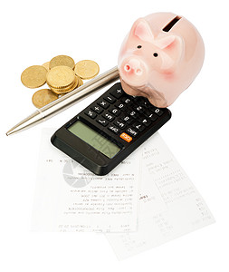 装有计算器和硬币的小猪银行粉色利润储蓄银行业财富货币现金小猪金子白色图片