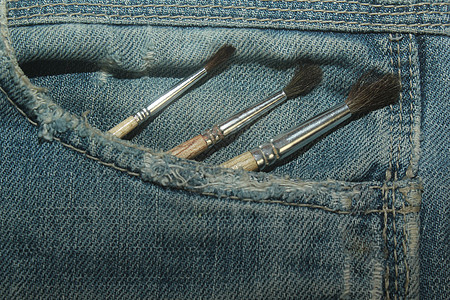 牛仔裤口袋的Brushes背景图片