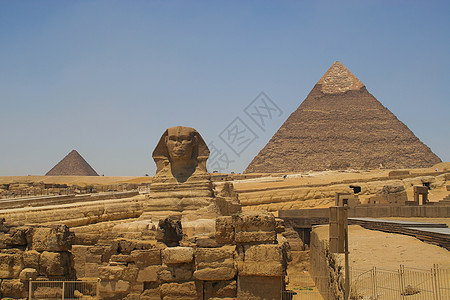 斯芬克斯和金字塔砂岩狮身沙漠石头古董天空景点游客岩石旅行图片