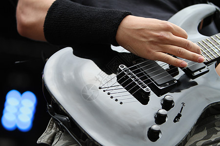 吉他员岩石派对紫色噪音吉他吉他手细绳独奏演奏家音乐会图片
