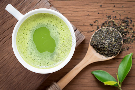 绿色马克杯绿色茶叶营养饮料 健康背景