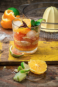 木制本底热带柑橘树水果鲜果汁食物玻璃柠檬热带橙子黄色饮料图片