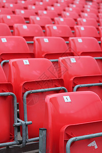体育场的空红色座位椅子水平推介会游戏塑料竞技场运动民众足球空白图片