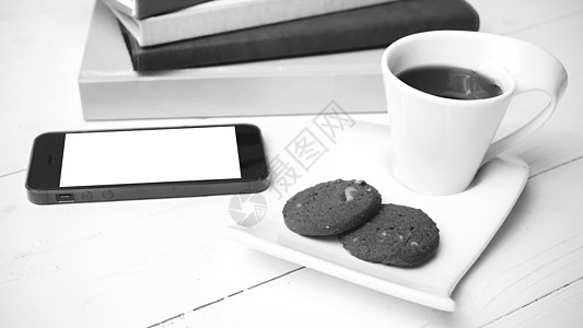 咖啡杯加饼干 手机和书卷黑白可乐眼镜桌子笔记本杯子工作咖啡网络电话钥匙细胞背景图片