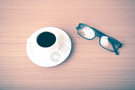咖啡杯和眼镜咖啡知识潮人图书桌子杯子背景图片