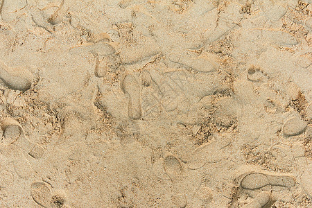 沙子上的脚印和鞋印图片