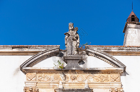 Coimbra大学入口处的雕刻地标历史晴天入口纪念碑学校历史性传统旅行天空图片