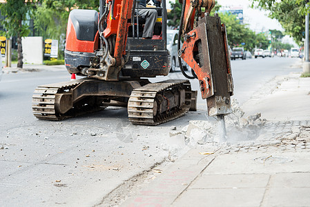 Ddrill公路车修理道路建造工业力量机器电钻地面挖掘机矿业背景图片