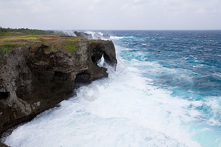 日本冲绳曼扎莫角海岸岩石村庄海浪风景晴天日落石头太阳编队图片