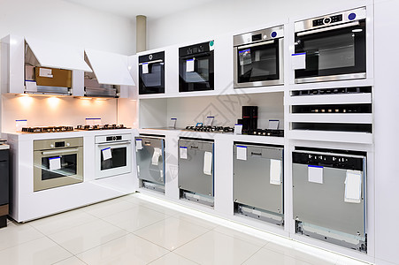 商店中的家用电器市场设备家庭电烤箱洗衣店库存烤箱洗衣机销售商业图片