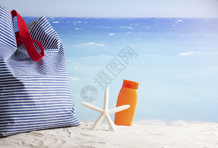 夏季背景 游泳和日光浴的海滩附件旅行海洋享受支撑防晒霜闲暇海星比基尼热带海岸图片