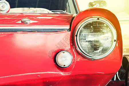 接近前灯灯光亮光的古典车 Vintage 特效样式运输古董展示炙烤车辆爷爷头灯反思大灯机器图片