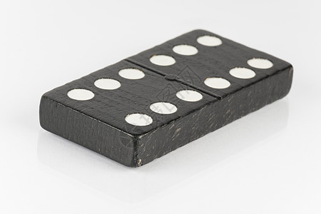 黑色多米诺砖砖石头建造焊接架子木头作品游戏桌面团结说谎图片