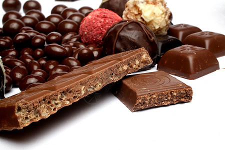 巧克力糖坚果薄片烹饪可可食物牛奶奶油东西糖果甜点图片