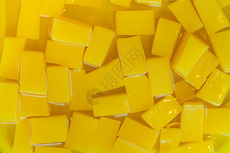 黄黄果柠檬黄色味道甜点糖果立方体派对明胶小吃凝胶图片