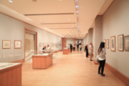 博物馆的模糊背景女士大厅城市展示房间大都会展览艺术游客女孩图片
