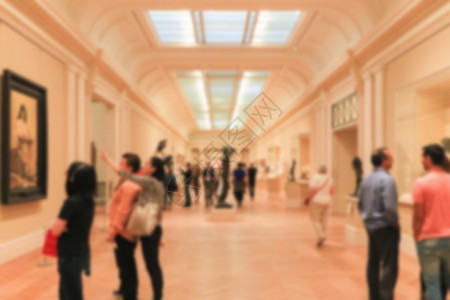 大都会艺术博物馆博物馆的模糊背景陈列柜建筑手表大厅艺术男人展览展示女士游客背景