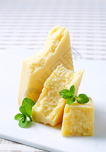 帕美干酪奶酪砧板小吃黄色食物奶制品羊乳美食背景图片