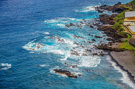 加那利群岛特内里费海岸波浪海洋旅游海岸海滩石头旅行蓝色天空海景火山图片