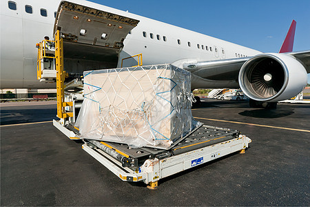 装载货机货物货运运输平台飞机场天空航班船运行李商品图片