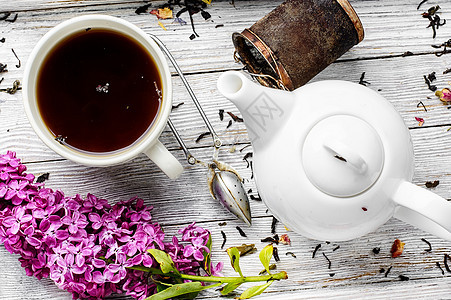 淡制草药茶花束杯子植物桌子茶壶药品早餐香气饮料草本植物图片