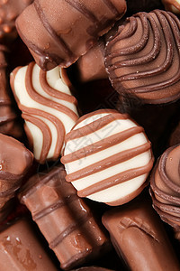 巧克力食物坚果美食宏观圆形糖果小雨花生红色松露图片