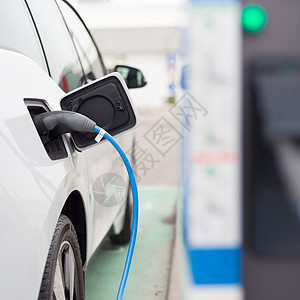 充电站的电动车收费环境交通燃料驾驶插头马达能源绿色杂交种图片