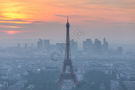 日落时对巴黎的空中观察天空橙子建筑首都辉光防御广场天线旅行全景图片