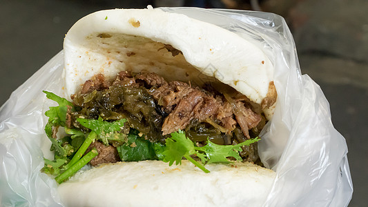 街头食品市场台湾猪肉三明治面包gua Bao香料白色绿色食物午餐美食营养面包包子街道图片