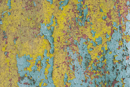 黄色纹理铁表面上的油漆剥落非常适合您的项目背景或纹理金属绿色腐蚀恶化墙纸褐色床单棕色黄色胭脂红背景