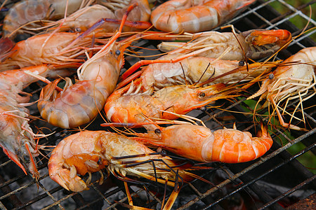 烧烤炉上的虾子营养熏制贝类小吃对虾红色美食牛扒派对食物图片