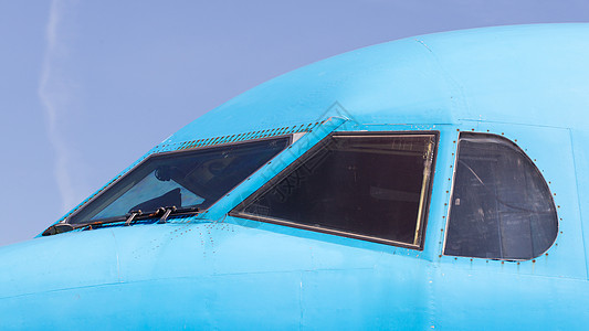 特写喷气飞机的驾驶舱飞机场运输窗户民间旅行喷射蓝色航班车辆座舱图片
