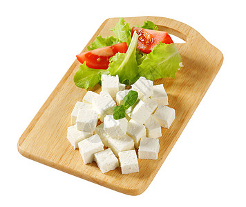 Feta 奶酪砧板美食白色盘子小吃蔬菜奶制品食物立方体图片