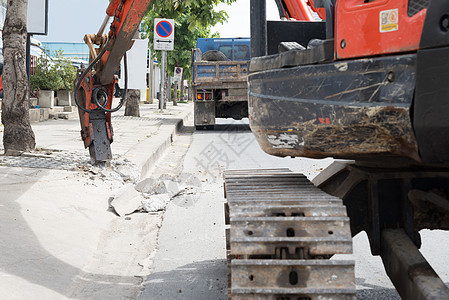 Ddrill公路车建造地球矿业钻头作品挖掘机道路力量技术钻孔背景图片