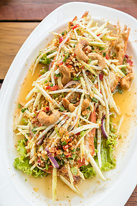 香辣芒果海鲜沙拉餐厅洋葱烹饪美食油炸草本植物传统腰果沙拉花生图片