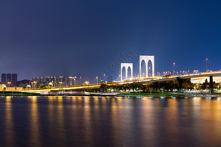 澳门市风景建筑学办公室地标池塘日落摩天大楼城市景观运输观光图片